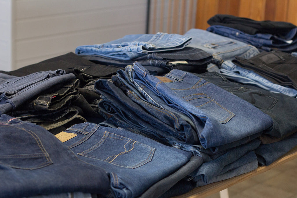 Picture of old denin jeans as an example of clothes that can be upcycled.